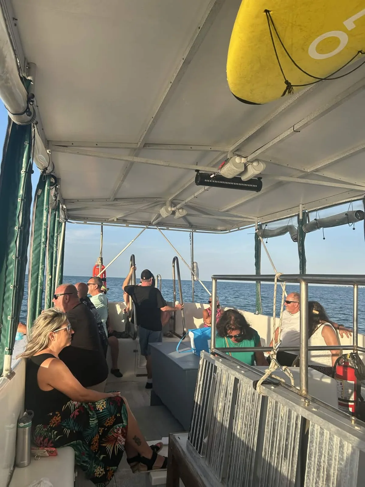 Guests relaxing aboard a private boat charter in Marathon